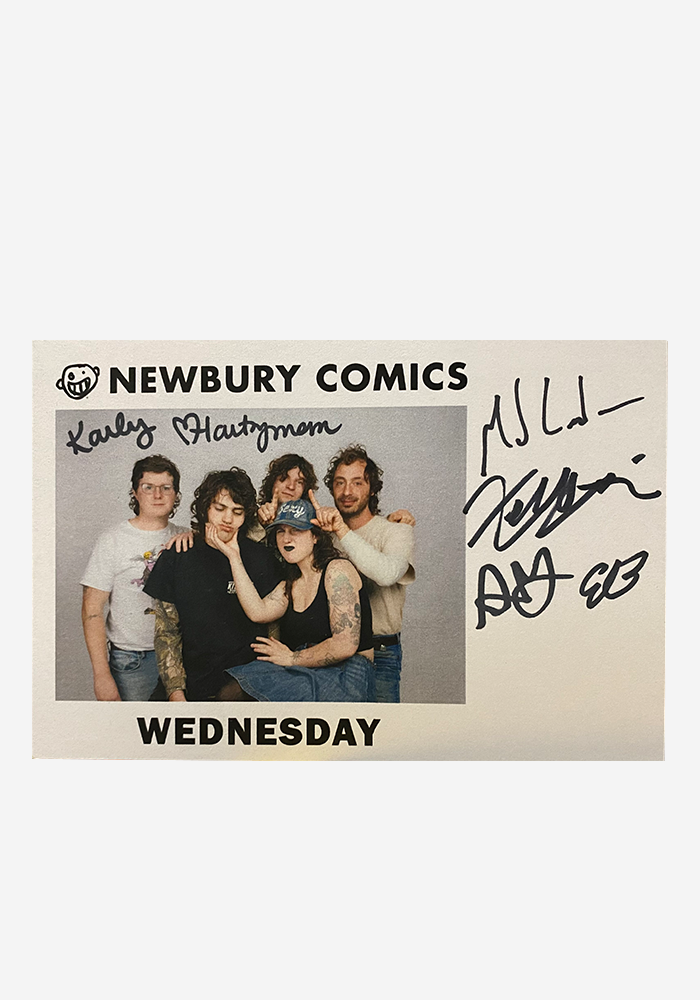 Image of an autographed postcard by the members of Wednesday band